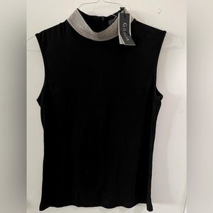 Women’s sleeveless turtleneck top